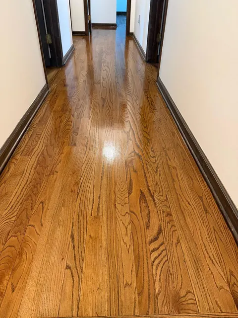Refinished oak hallway with dark stained trim